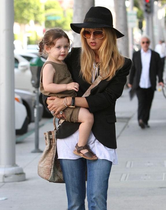 EXCLUSIVE!! Style guru Rachel Zoe looks every bit the proud mom as she  pushes her son Skyler while shopping at the Louis Vuitton store in Beverly  Hills, CA. 20th December 2011 Stock