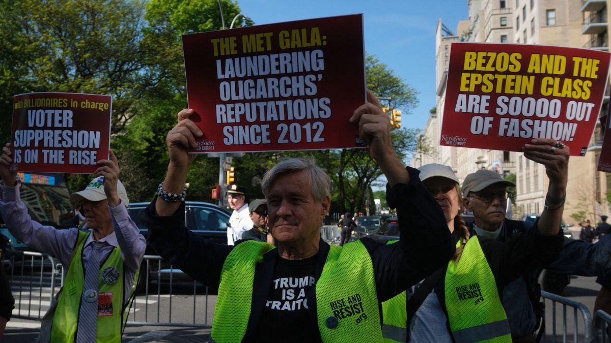 Photo of Dozens of people protested the Bezos-sponsored event in NYC.