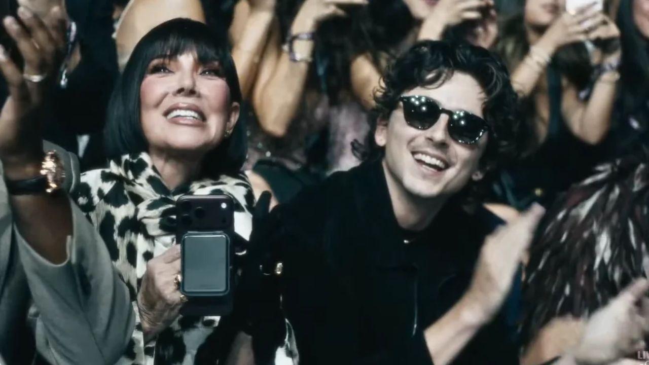 image of Timothée Chalamet wore a long-sleeved black top and sunglasses as he joined the Kardashian-Jenner family.
