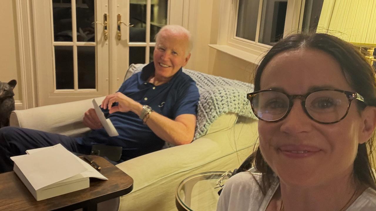 Image of Joe Biden smiled wide alongside his daughter Ashley Biden.