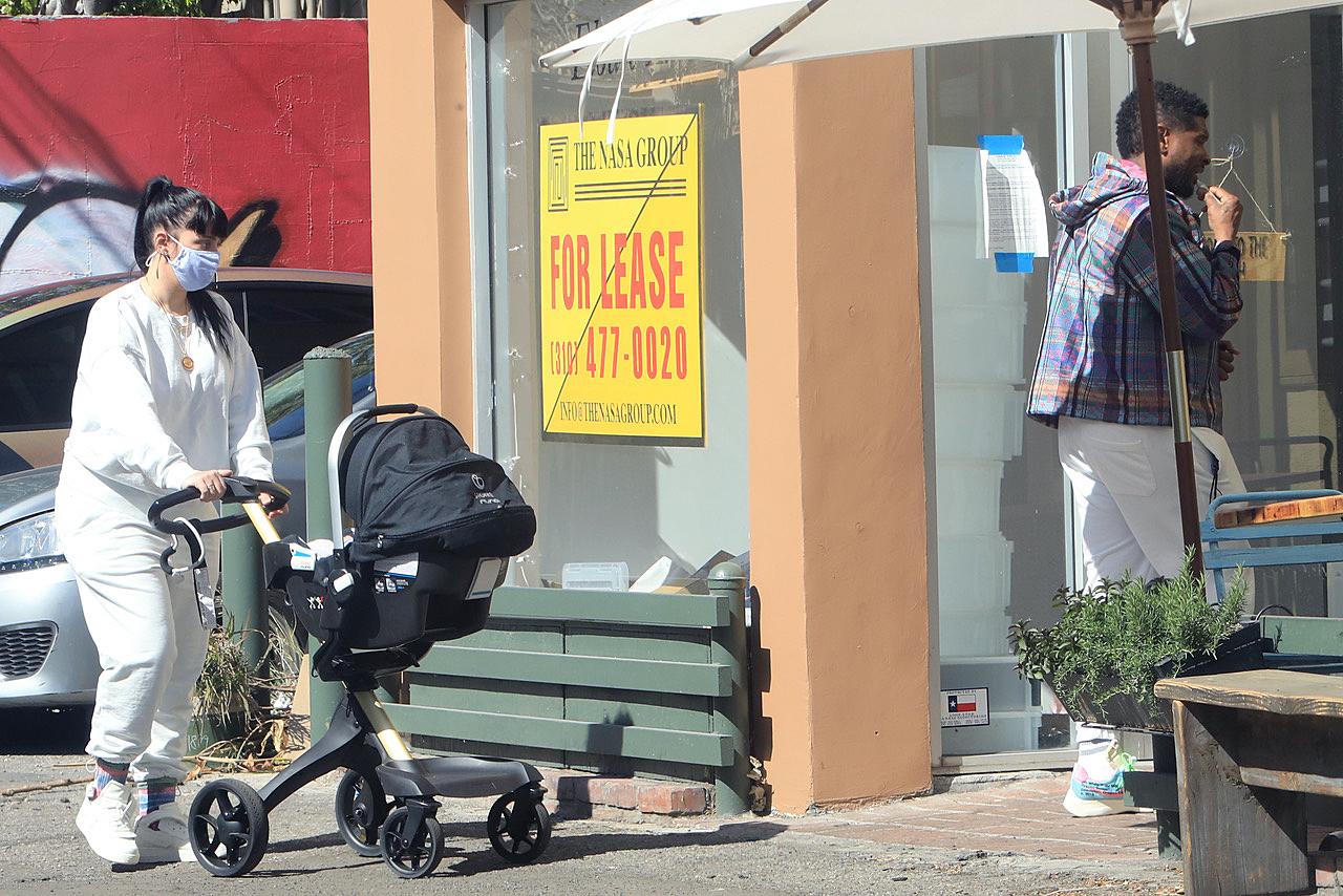 usher and girlfriend spotted with newborn baby