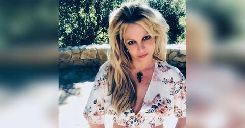 britney spears marks return to instagram with topless throwback pp