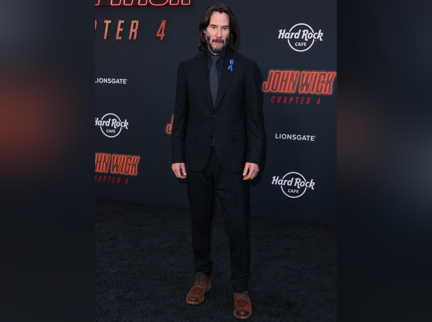 Why Keanu Reeves wore blue ribbon to 'John Wick 4' premiere - Los Angeles  Times