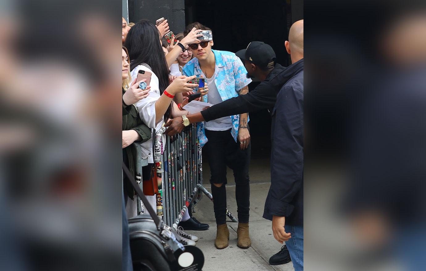 Harry Styles Crushes Fan In World Tour Promo