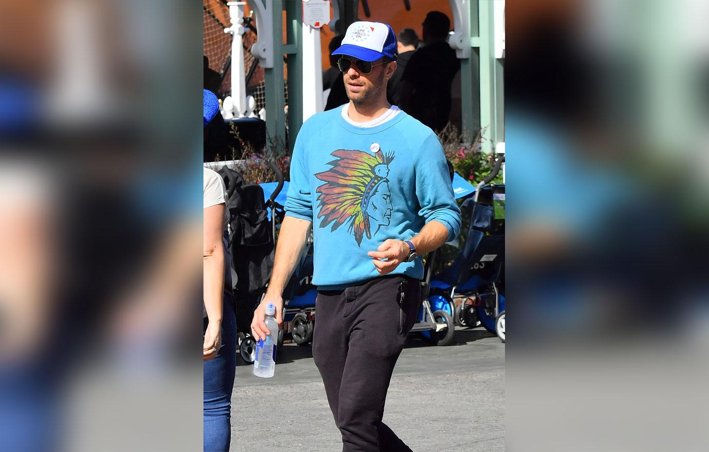 Chris martin in blue tee