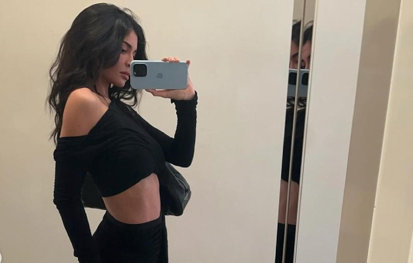 Kylie Jenner New Sensual Plunging Black Crop Top & Tight Leggings