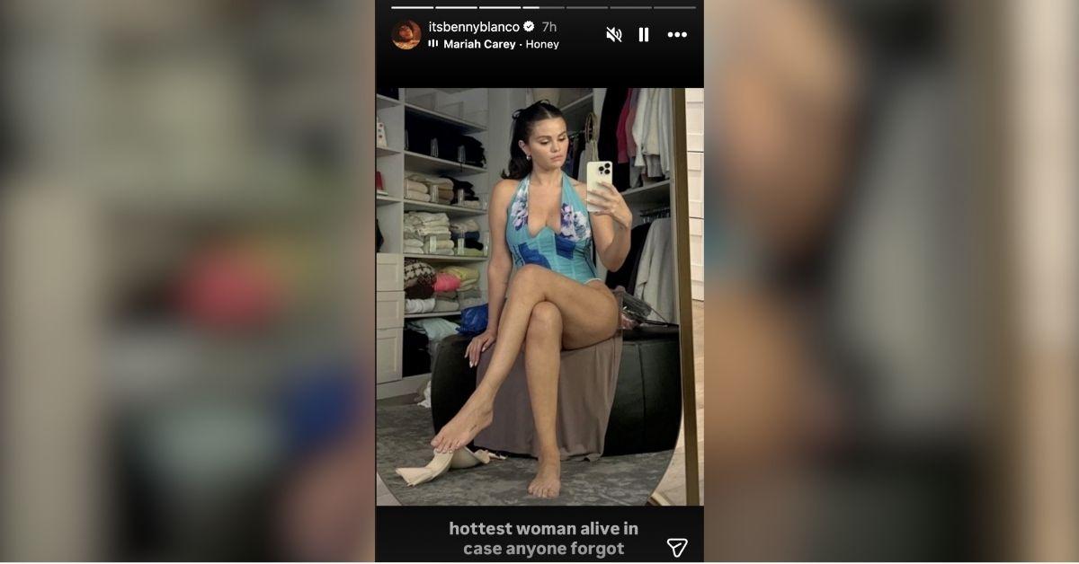 image of Selena Gomez wore a blue floral bathing suit in a selfie.