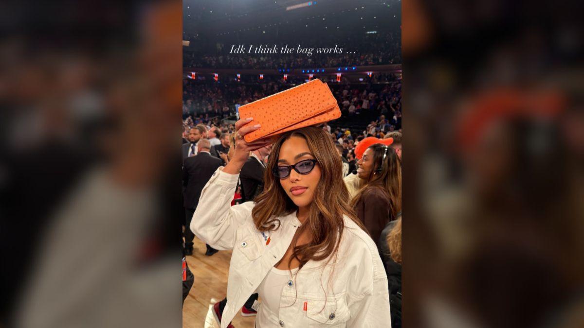 Photo of Jordyn Woods flaunted her 'good luck' bag while sitting courtside at Madison Square Garden.