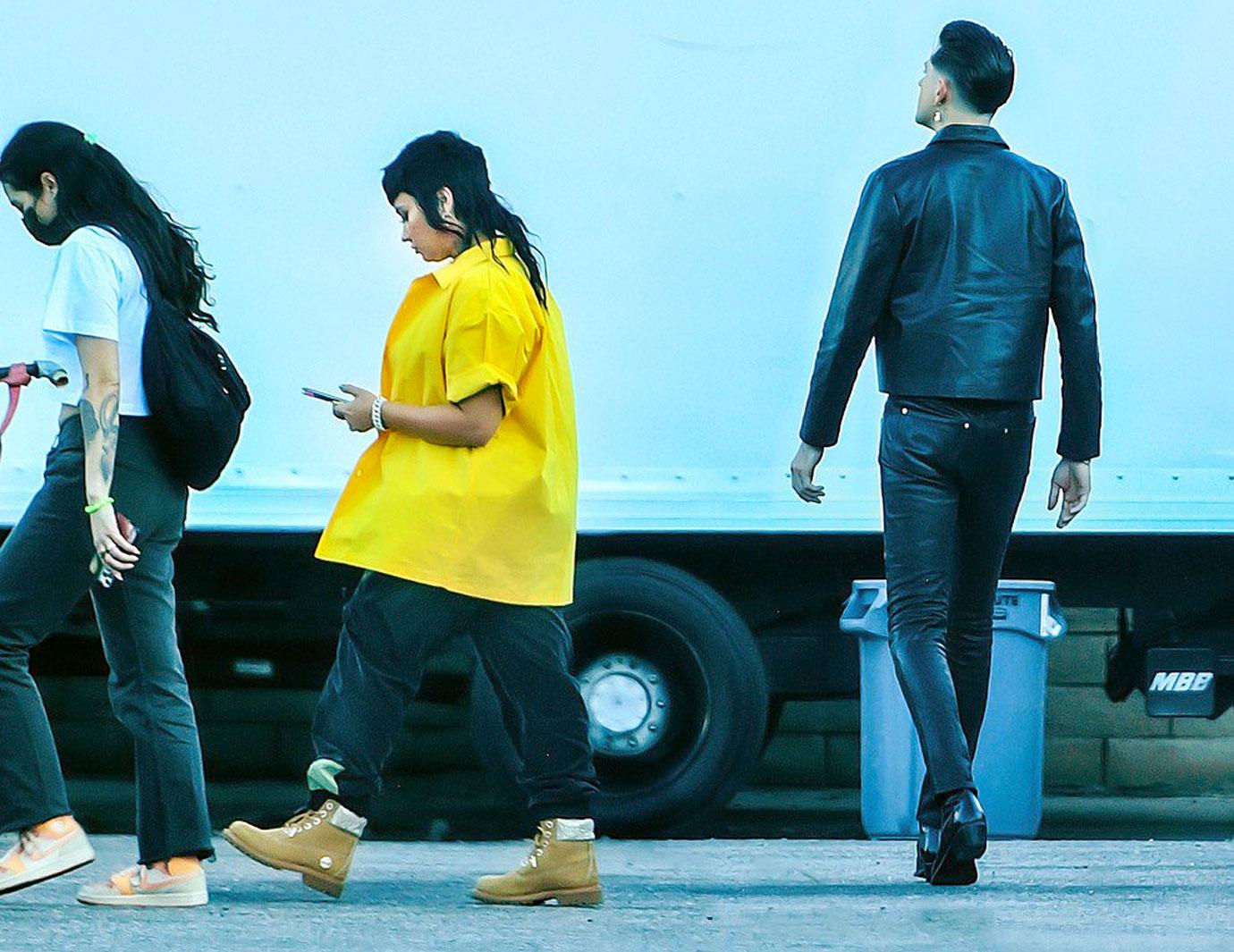 demi lovato sports a funky mullet while on the set of a music video with rapper g eazy in los angeles