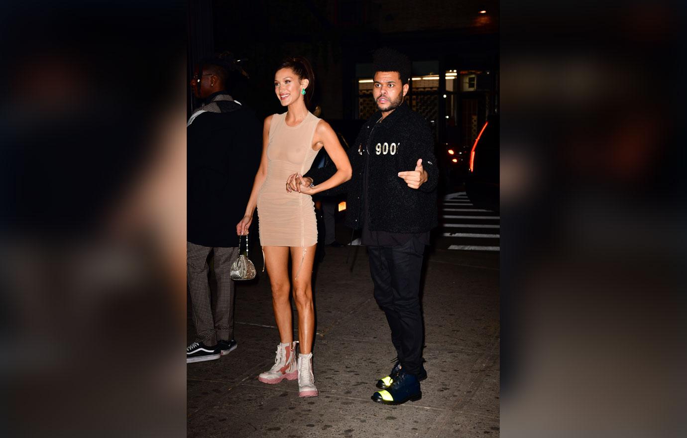 Bella Hadid And The Weeknd Take Late Night Pier Walk Photos