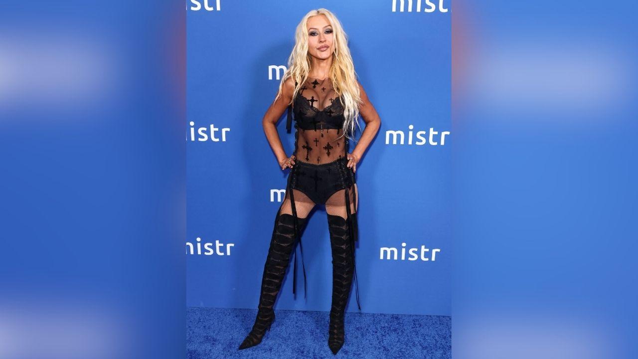 image of Christina Aguilera turned heads in a sheer black minidress at MISTR’s annual National PrEP Day celebration in West Hollywood.