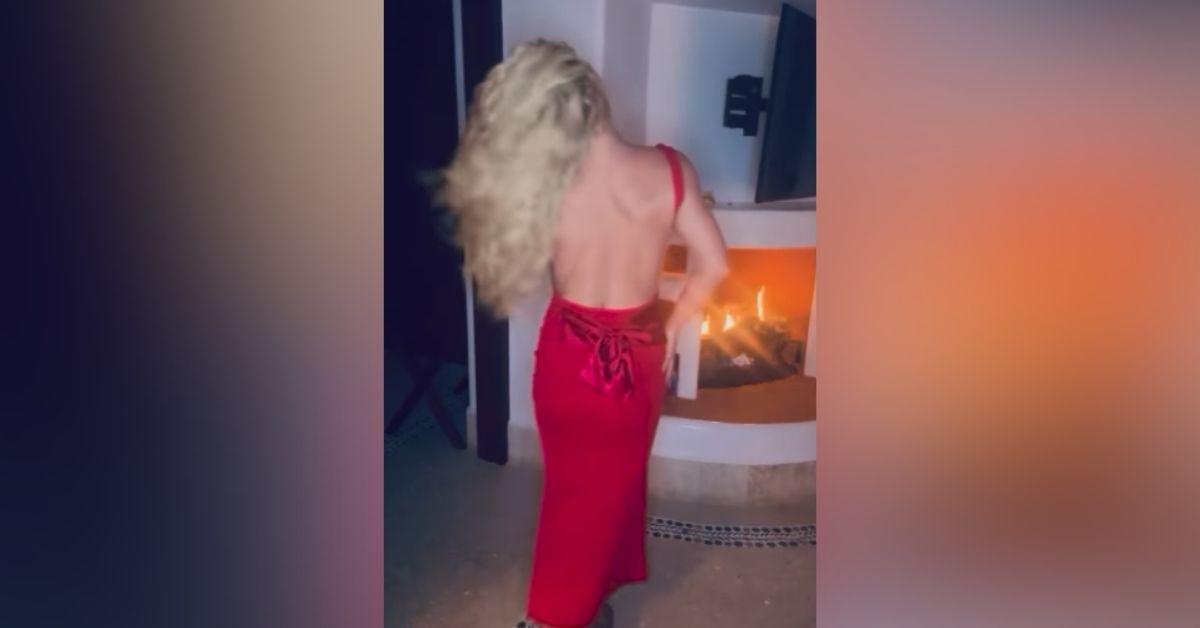 image of The singer twirled in the hallway and showed off her toned figure.