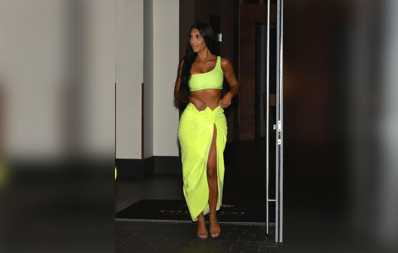 Kim Kardashian wears very revealing wrap skirt and has a wardrobe malfunction in Miami