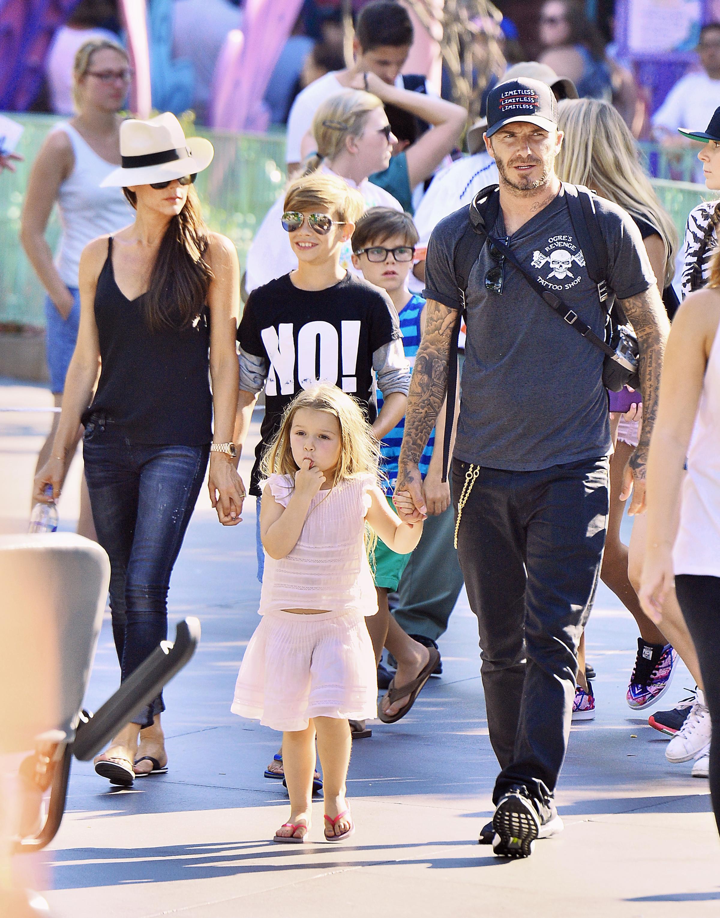 David Beckham and Victoria Beckham spend the day with their kids at Disneyland in Anaheim, CA. **ORIGINAL DATE TAKEN 08/24/15**