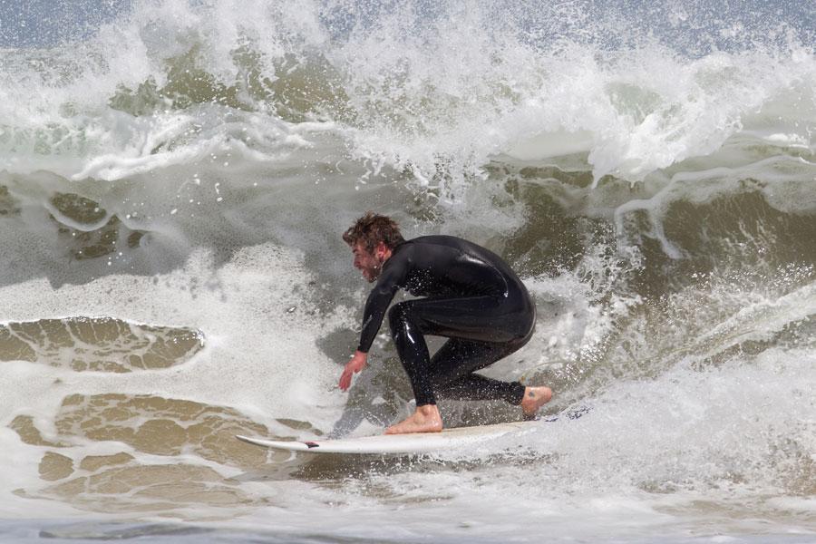 Liam hemsworth shirtless surfing beach photos 03