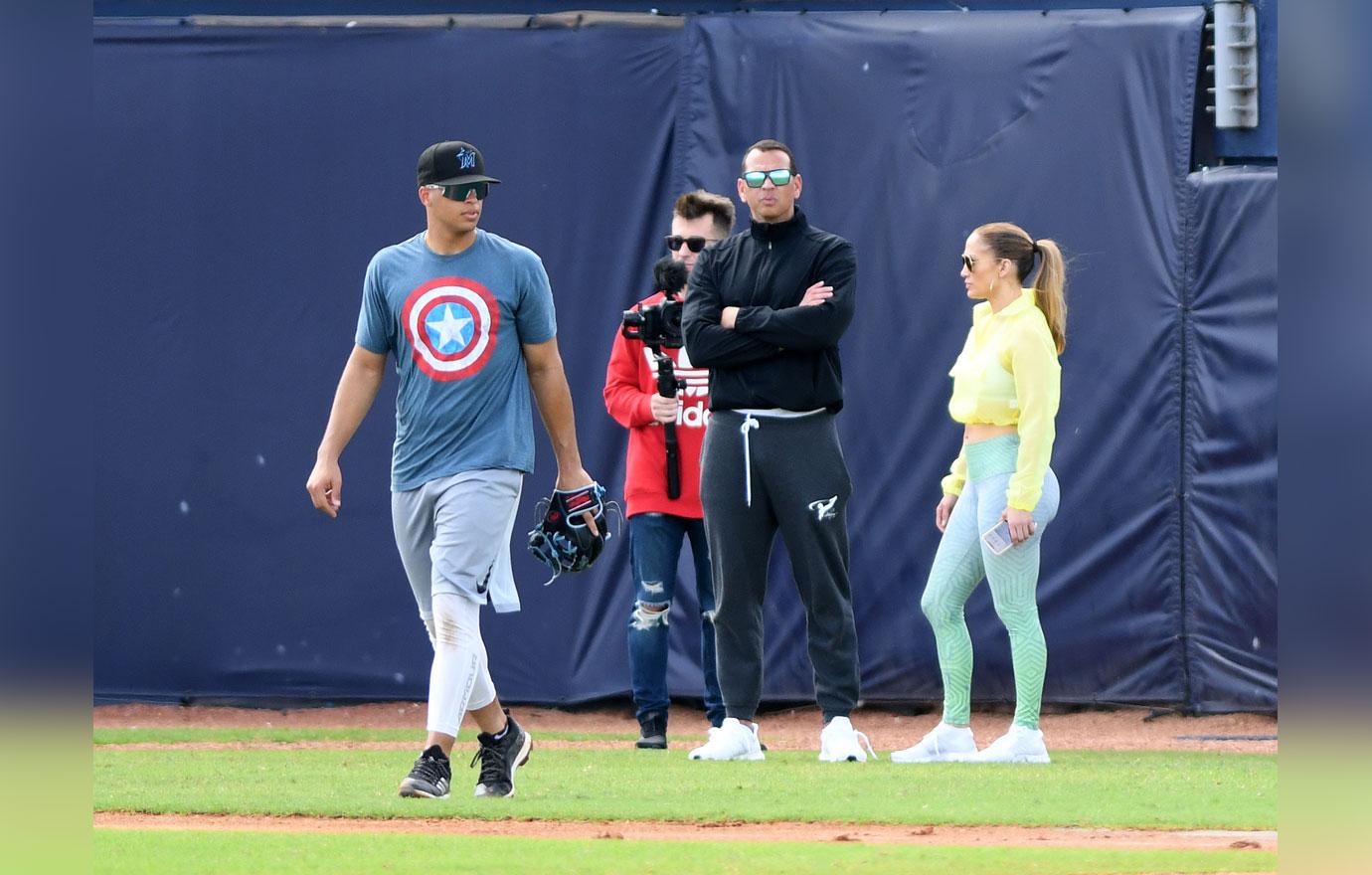 Alex Rodriguez and Jennifer Lopez at baseball field