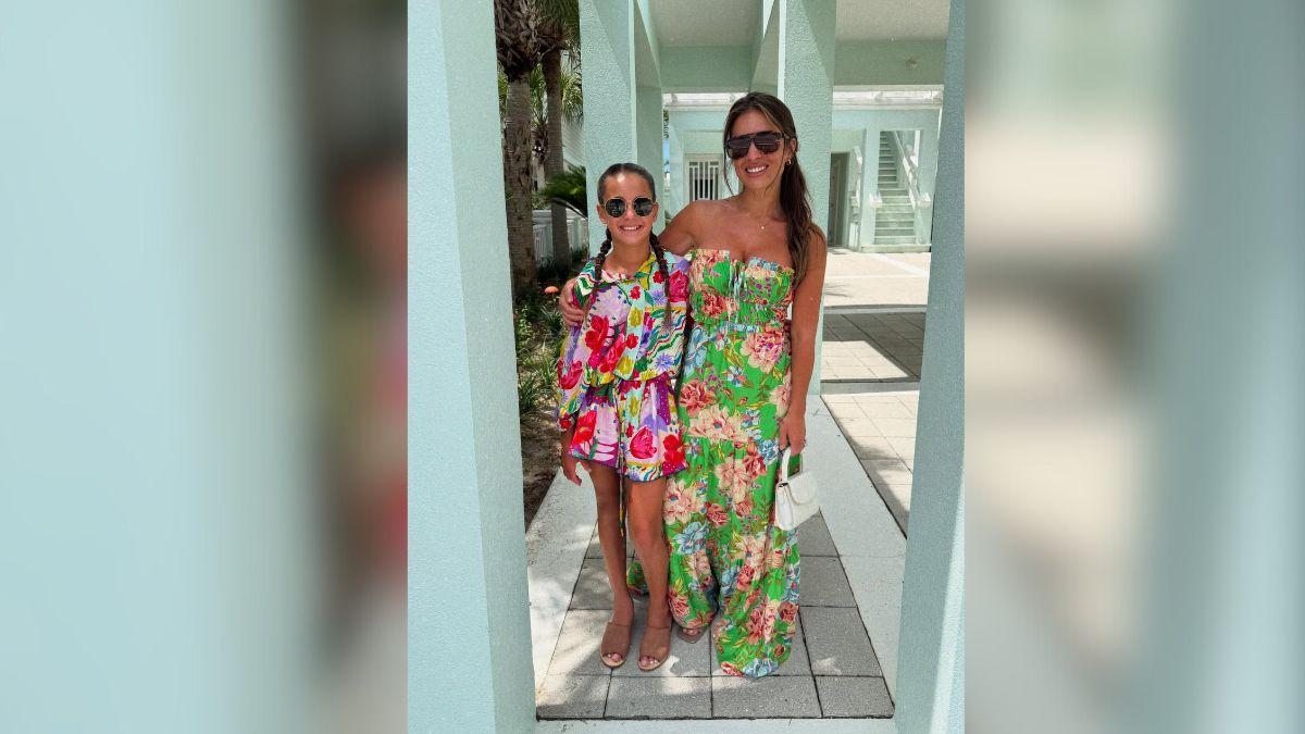 image of The star's daughter helps out with her youngest brother. 