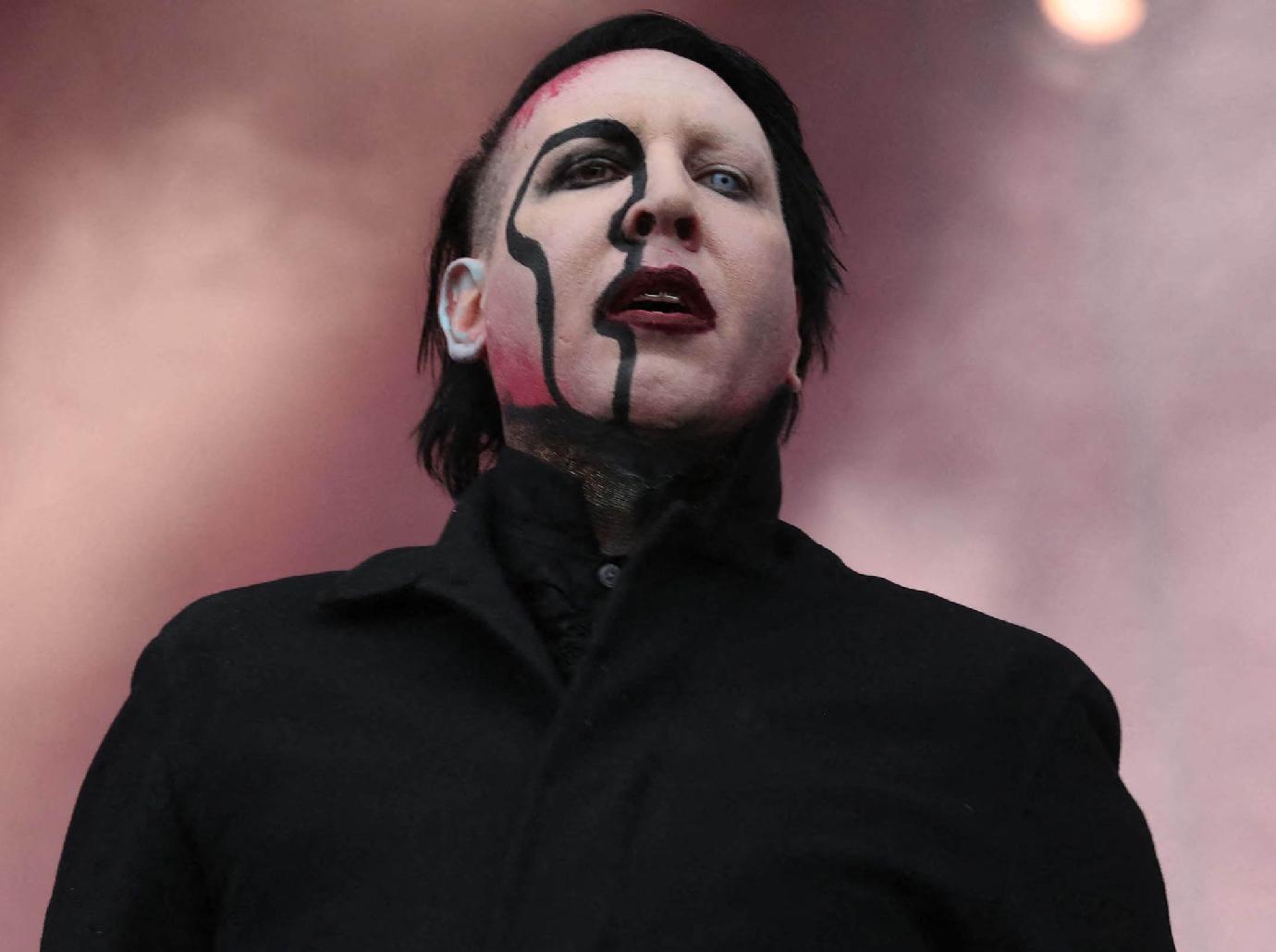 marilyn manson drops defamation lawsuit evan rachel wood pay fees