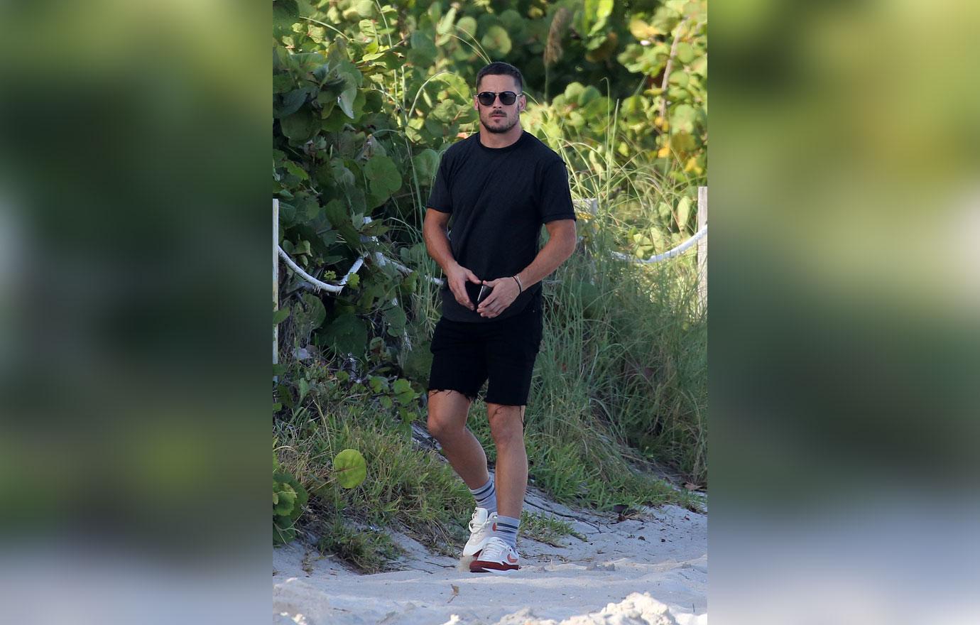 EXCLUSIVE: Dumped Danny Amendola returns to the beach where he was seen flirting with a girl while now ex girlfriend Olivia Culpo was out of town &#8211; minus a watch!