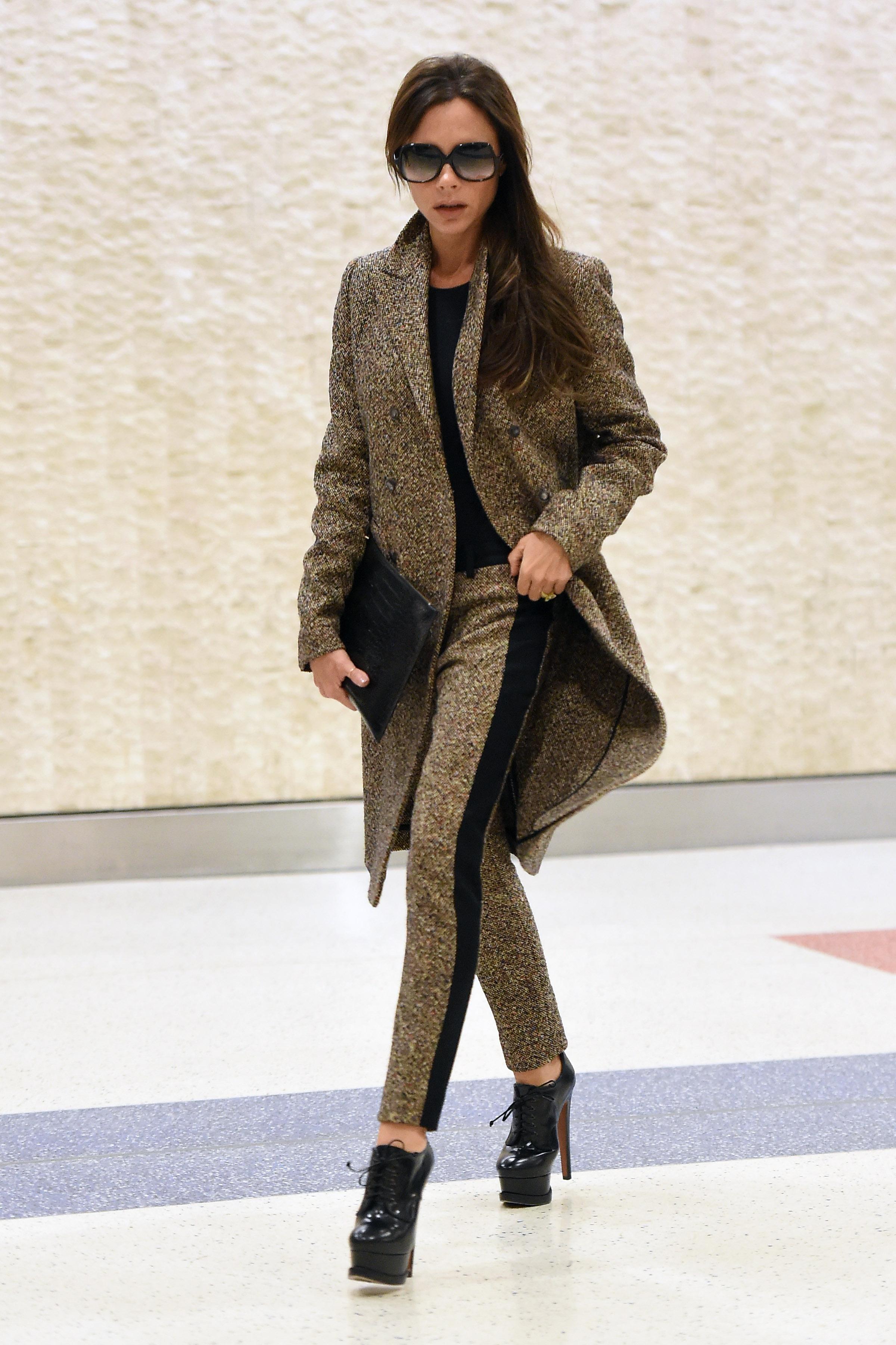 Victoria Beckham arrives at JFK airport in NYC.