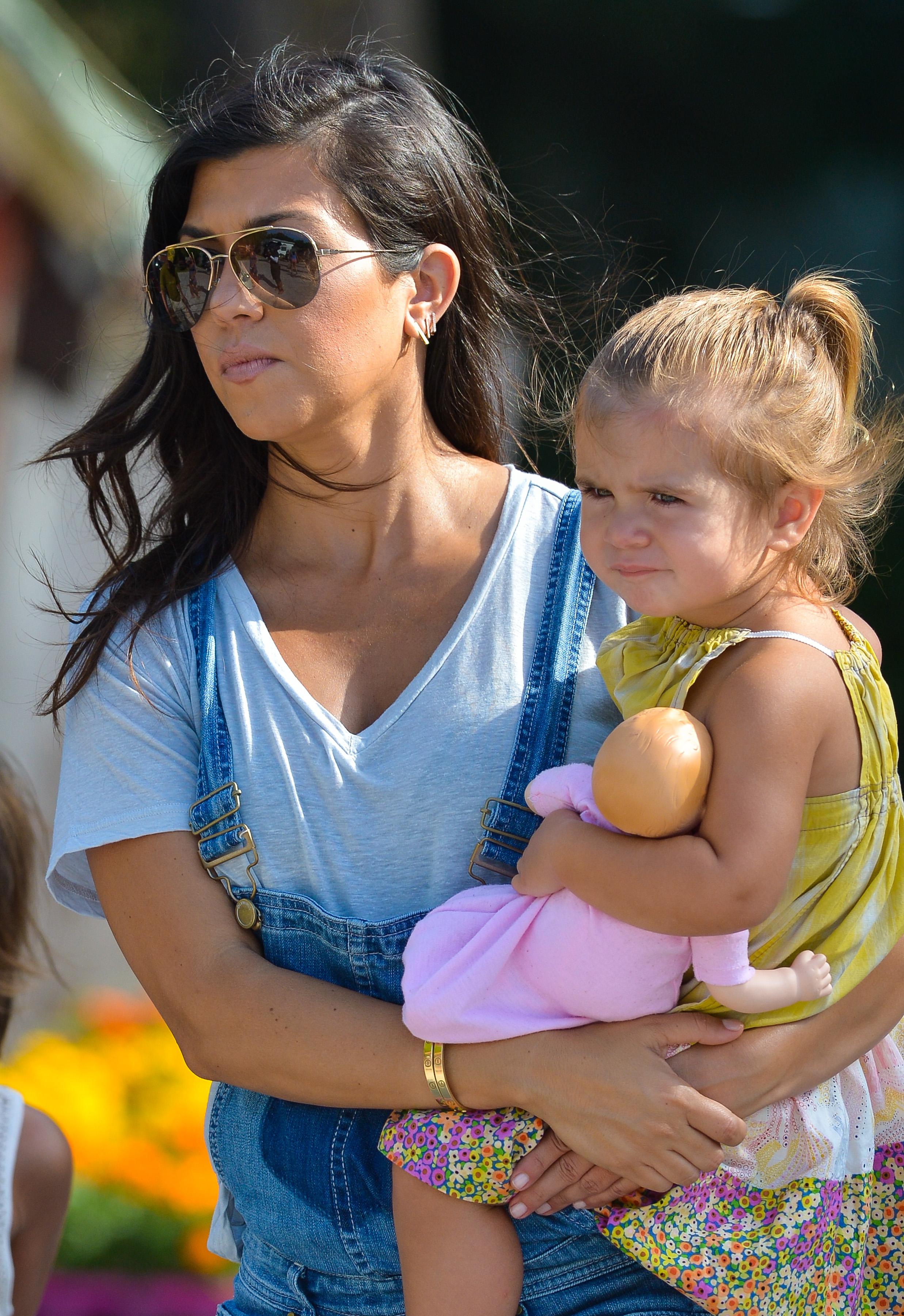 Kourtney Kardashian and her family pick strawberries in Southampton