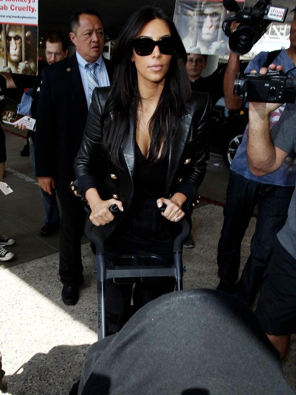 Scott Disick departing on a flight at LAX airport for Kim's