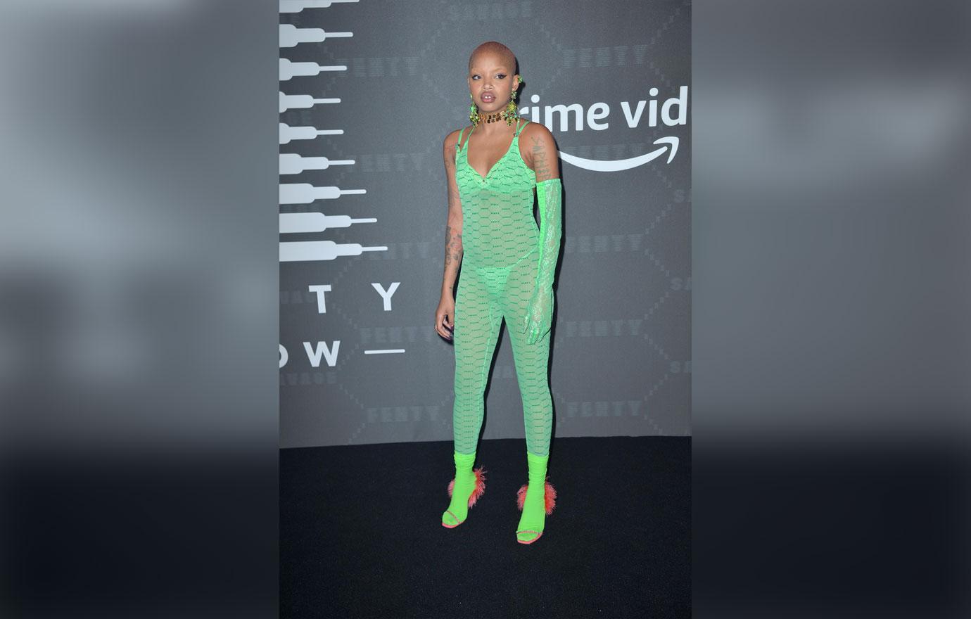 Slick Woods Wearing Lime Green Jumpsuit