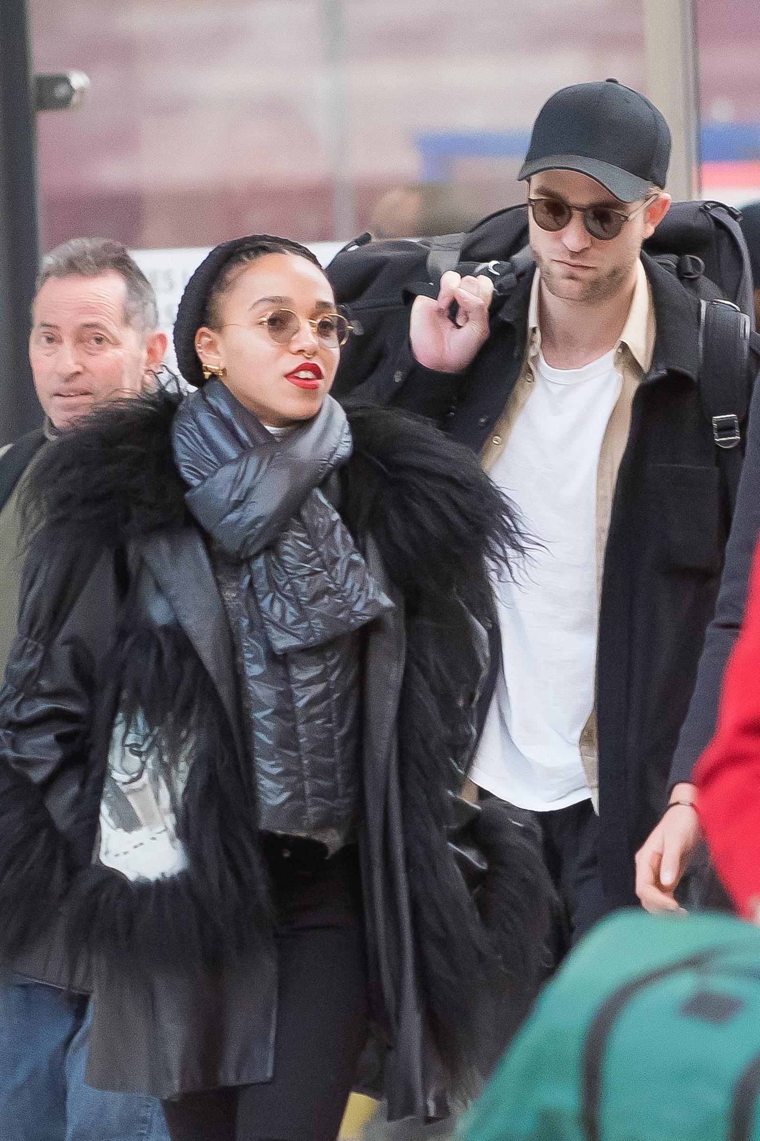 *EXCLUSIVE* FKA Twigs and Robert Pattinson arrive in Paris ahead of her Concert **USA ONLY**