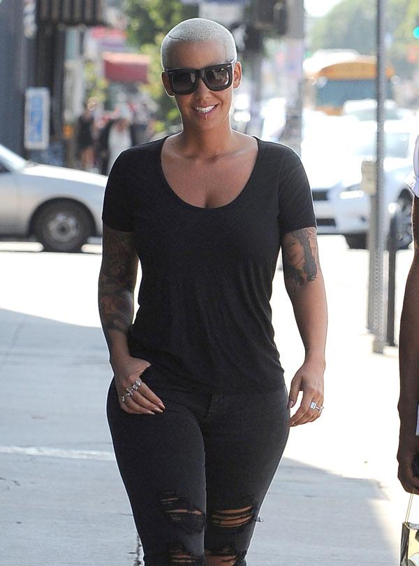 Amber rose lip piercing6