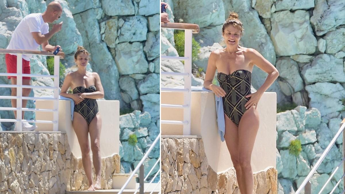 image of The star wore a black one-piece swimsuit that highlighted her toned figure.