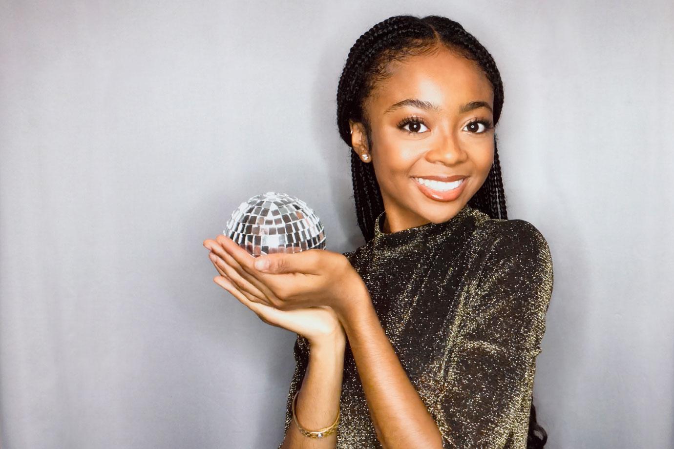 SKAI JACKSON holding mirrorball