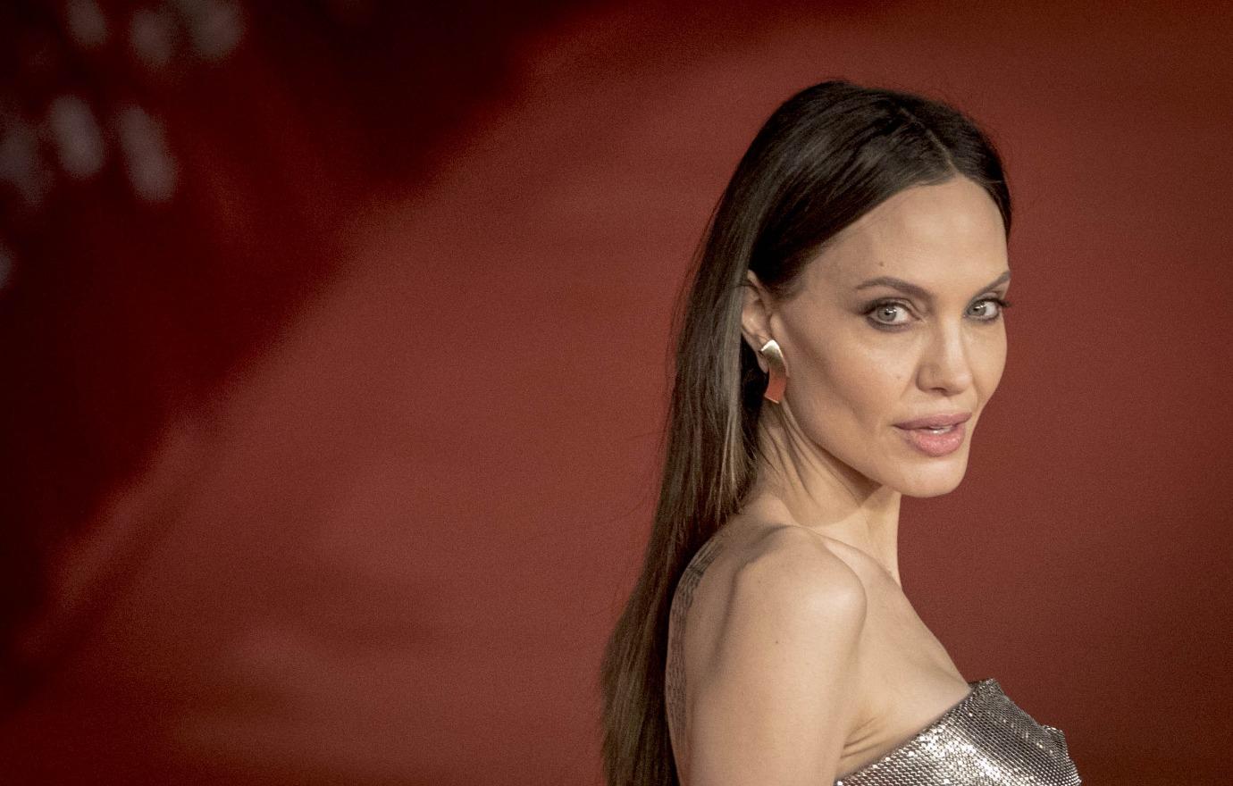 angelina jolie planning escape hollywood happiest when she traveled