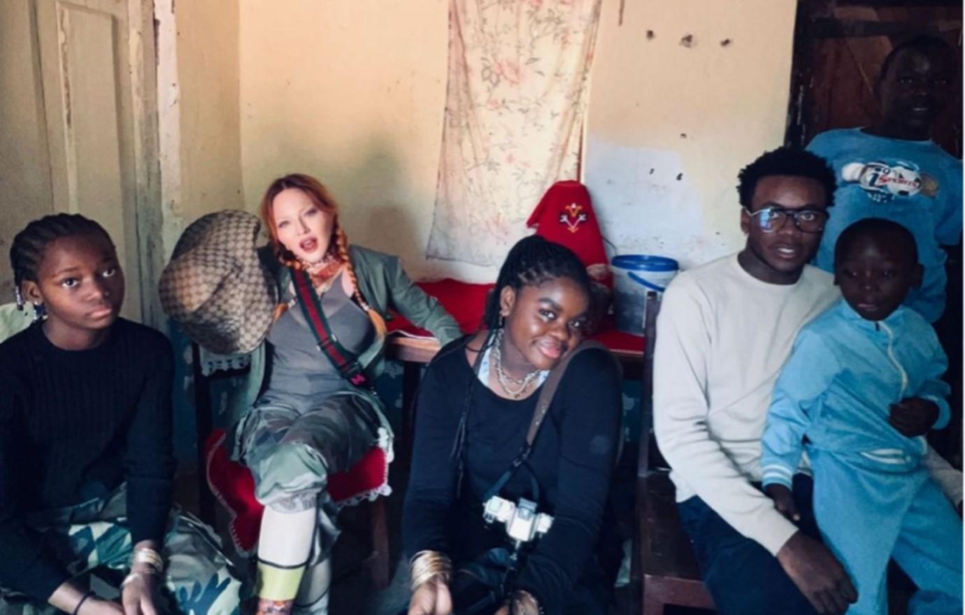 madonna sparks criticism designer clothes africa trip