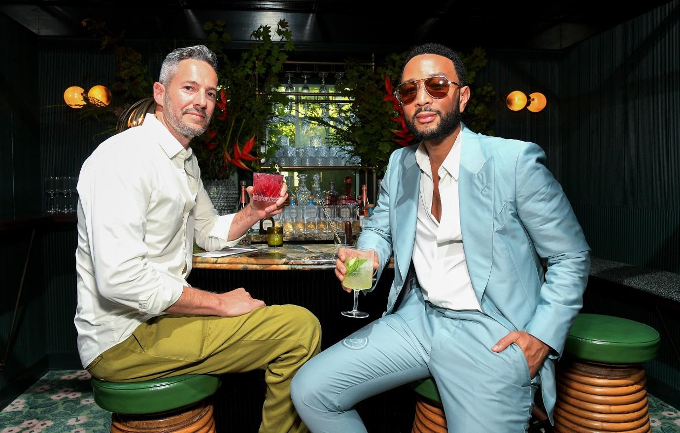 mike rosenthal and john legend attended the its good from the source dinner featuring specialty tequila don julio cocktails on july th in los angeles california