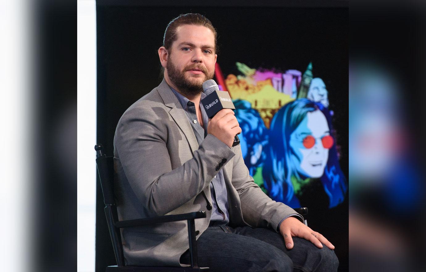 Jack osbourne with mic in his hand