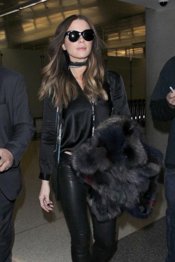 Kate Beckinsale arrives at LAX in leather and fur