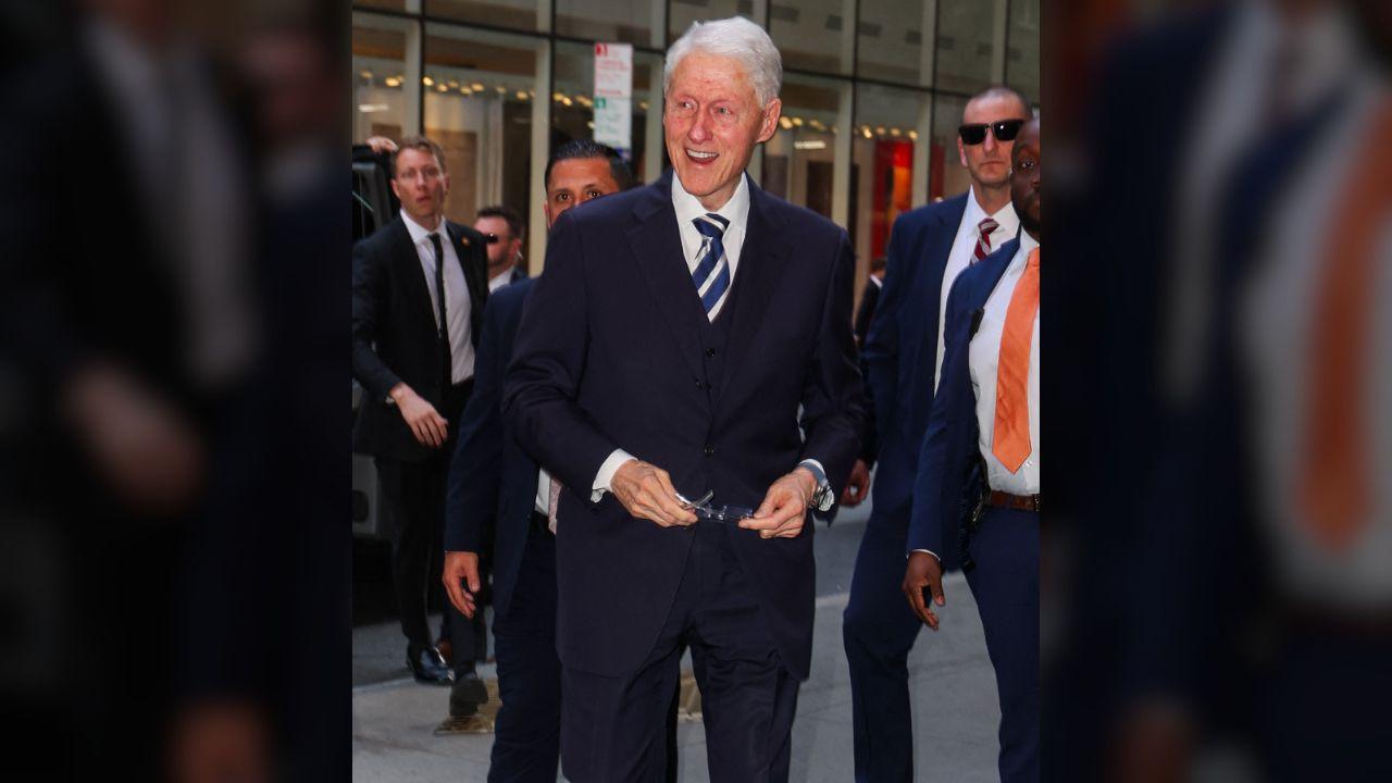Photo of Clinton and Maxwell both denied he ever flew to Epstein's island.