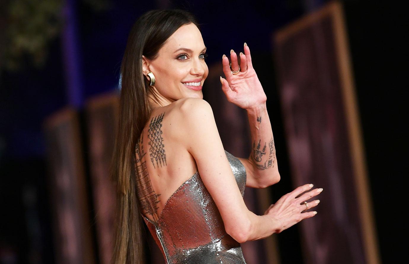 angelina jolie goes viral for hair extensions eternals premiere italy