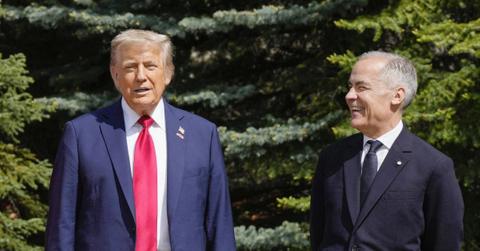 Photo of Donald Trump and Mark Carney.