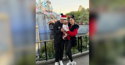 photo of Olivia Culpo, Christian McCaffrey and their daughter.