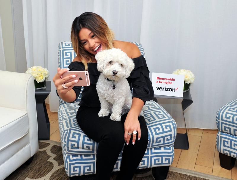 Gina Rodriguez Snaps a Selfie With Her Favorite Fan, Casper, During The Launch of Verizon`s Beinvenido a lo Mejor Contest