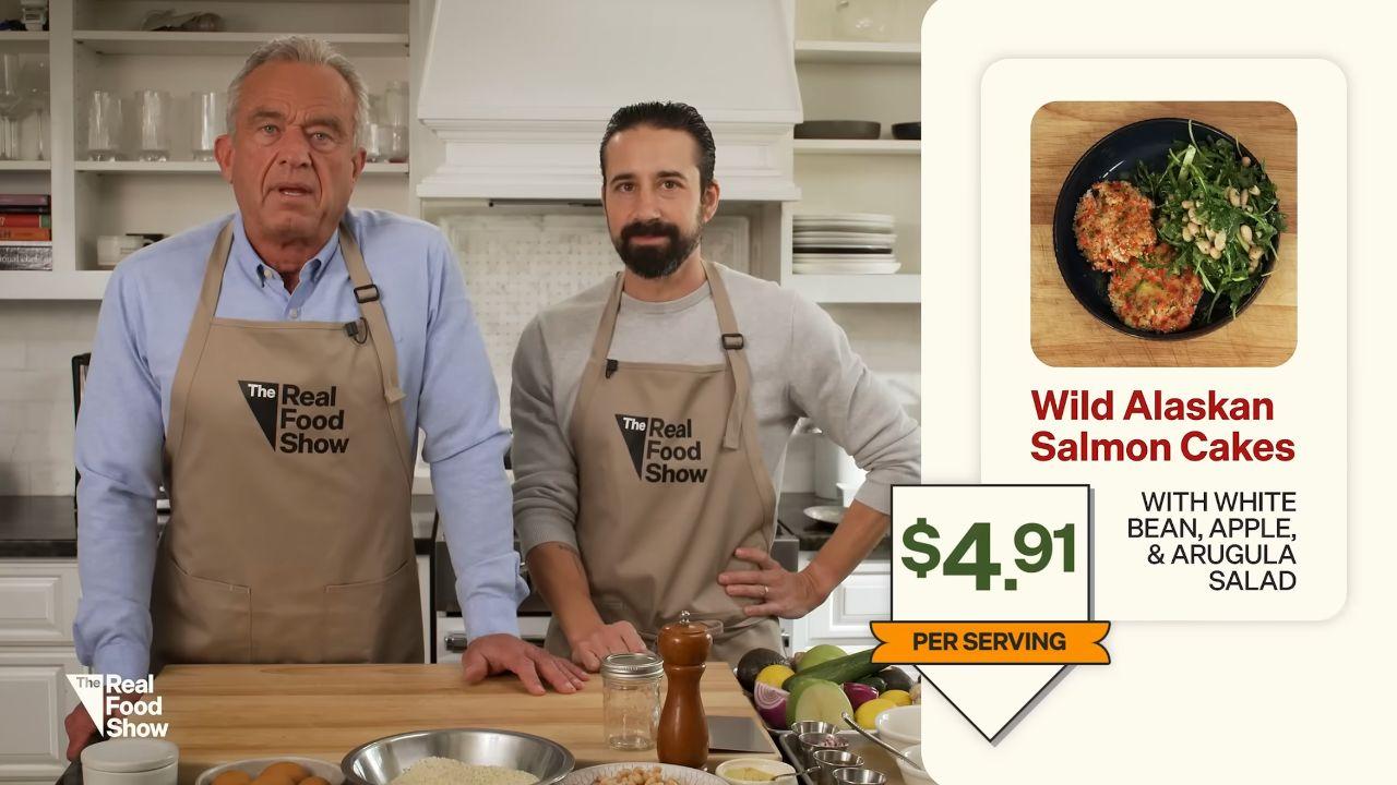 Image of Robert F. Kennedy Jr. prepared salmon cakes and a fresh salad in the show's debut episode with celebrity chef Andrew Gruel.