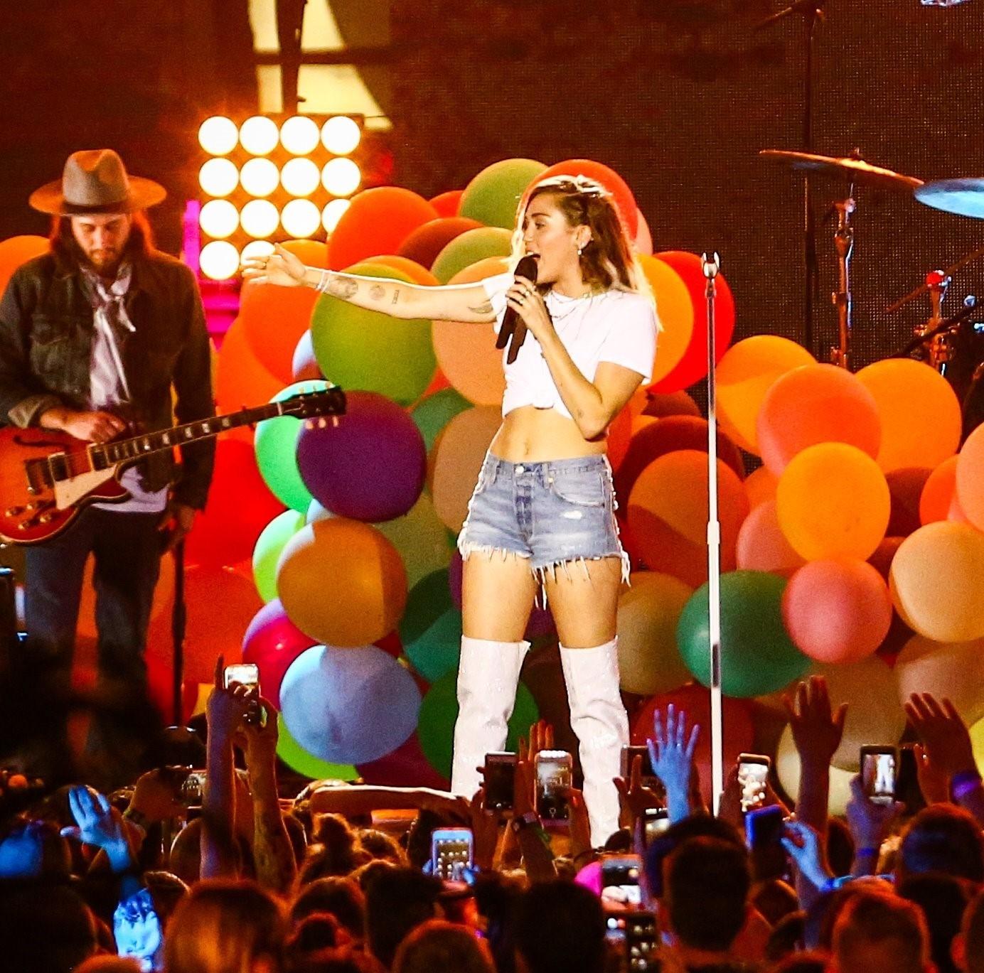 Miley Cyrus brings her colorful spirit to iHeartRadio