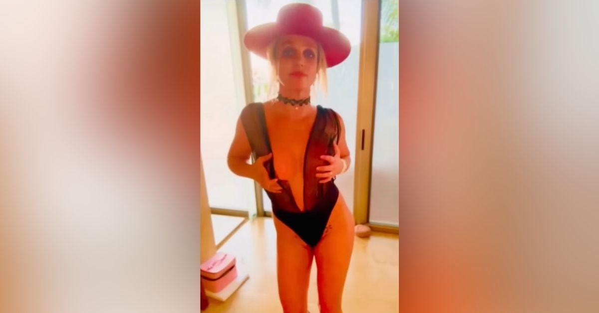 image of Britney showed off her body in a sheer black bodysuit.