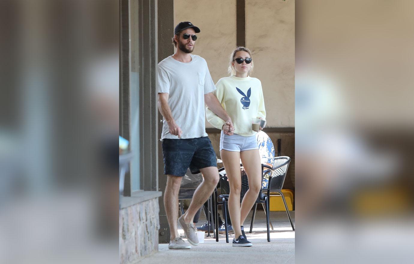 *EXCLUSIVE* Liam Hemsworth and Miley Cyrus look smitten as they enjoy their Saturday together hand in hand