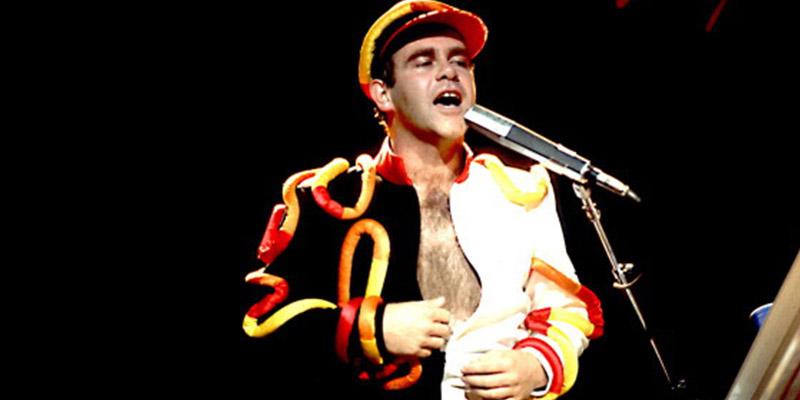 PICS] Elton John's Craziest Outfits Over The Years