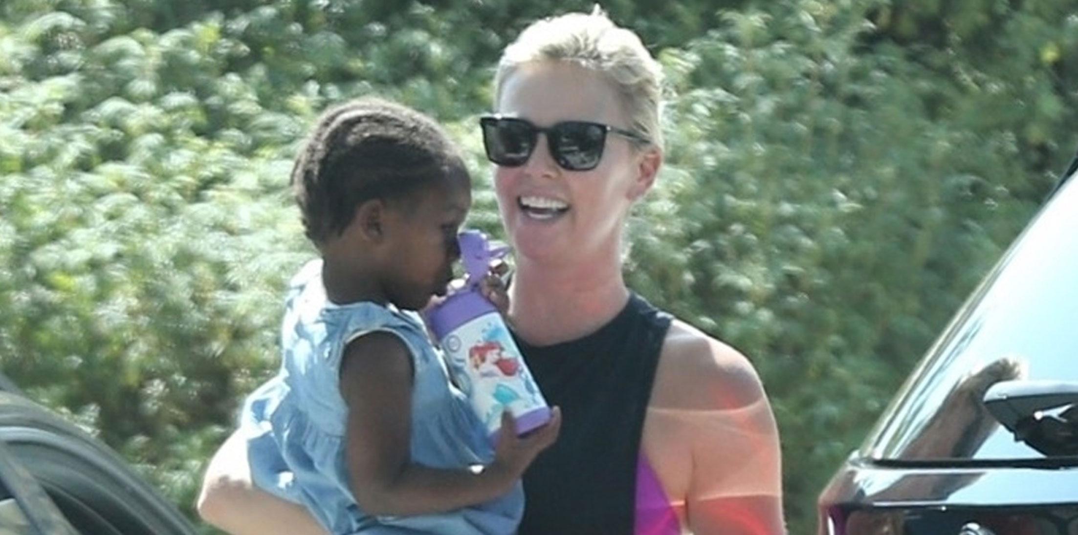 Charlize Theron Daughter Cute Pics Long