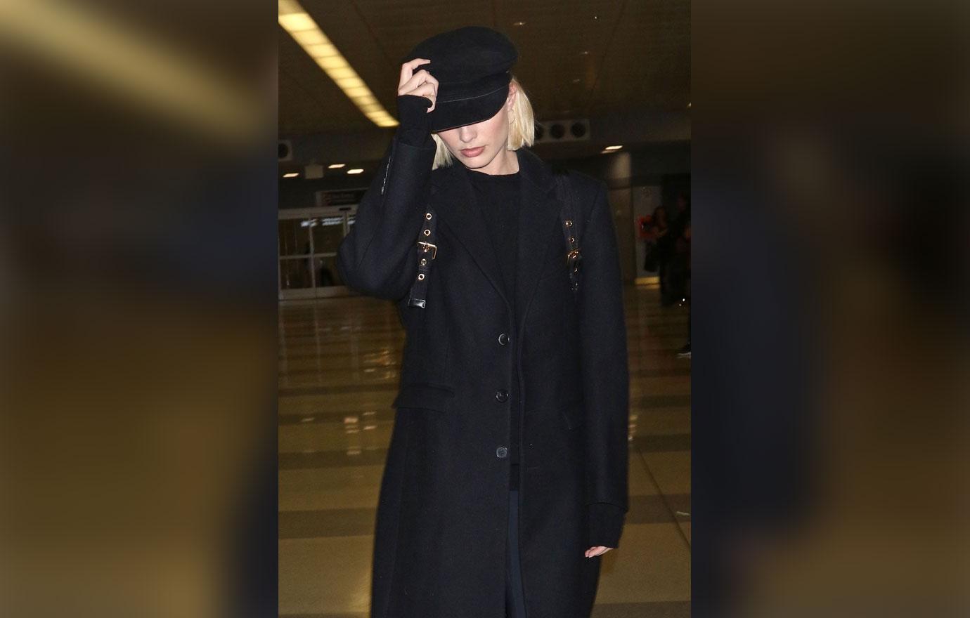 Margot Robbie keeps a low profile at JFK Airport