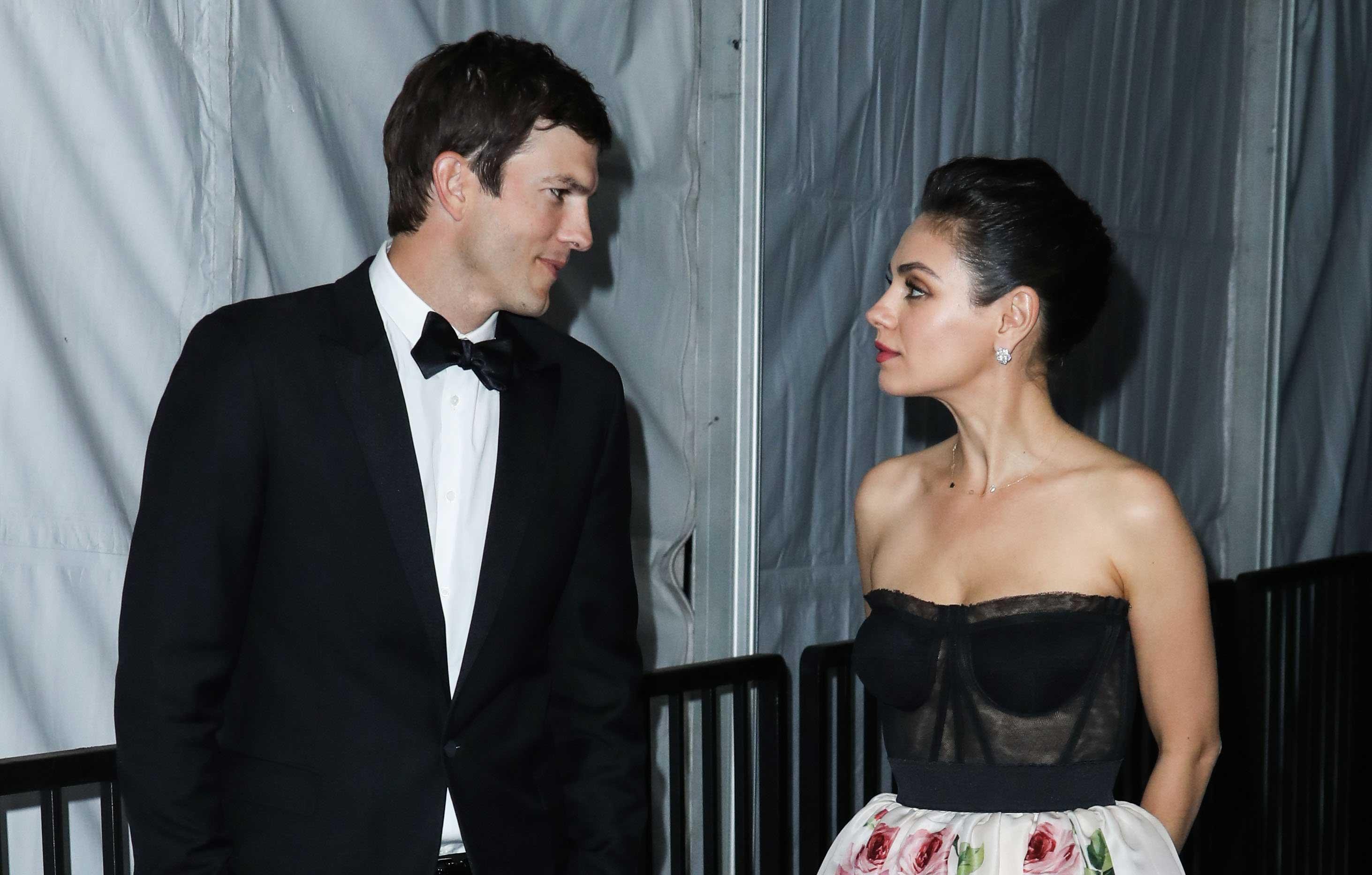 ashton kutcher reveals mila kunis completely different premiere reese witherspoon