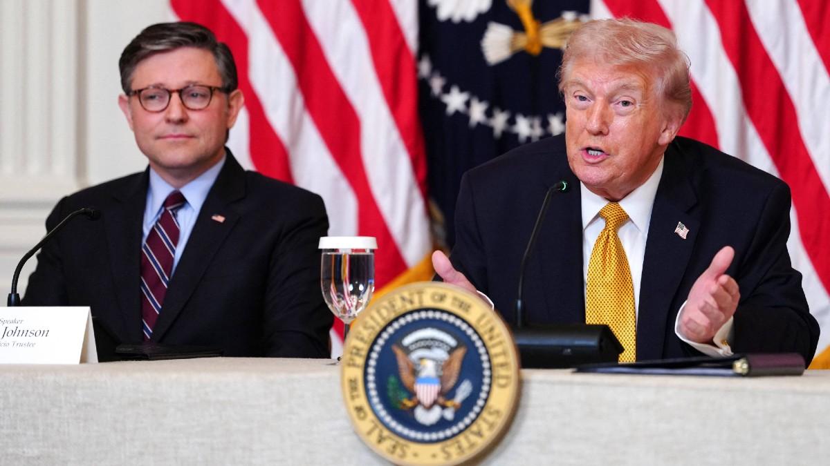 Photo of Mike Johnson and Donald Trump.